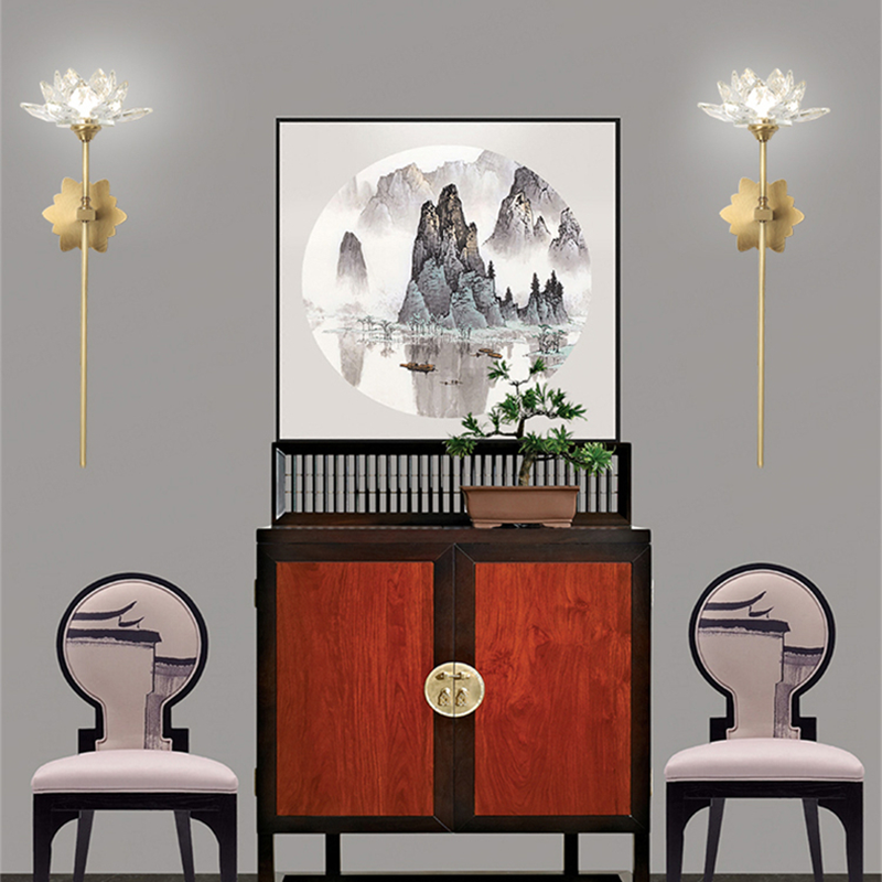Elegant Lotus Crystal Wall Lamp mounted in a cozy living room, providing warm LED lighting.