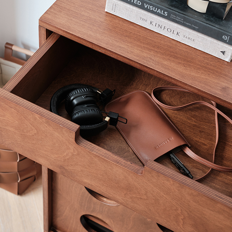 Side view of the 39" walnut birchwood storage cabinet showcasing its drawers and cabinets.