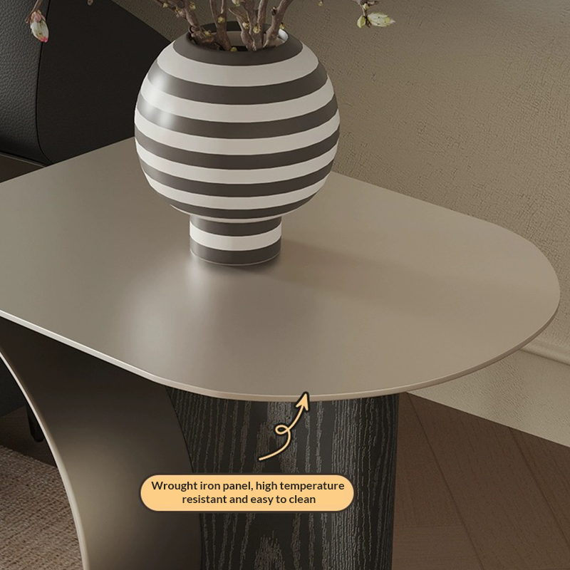 Chic Crescent Moon Coffee Table showcasing the elegant design from a side angle in a modern living room setting.