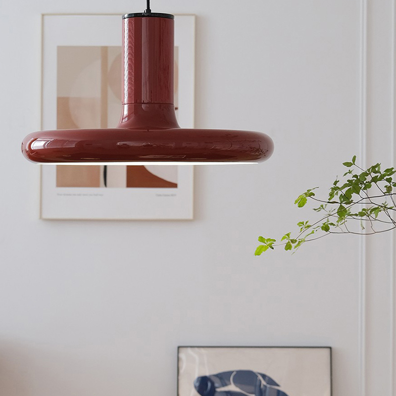 Retro Red UFO Pendant Light showcasing its wide shade in a cozy dining area.