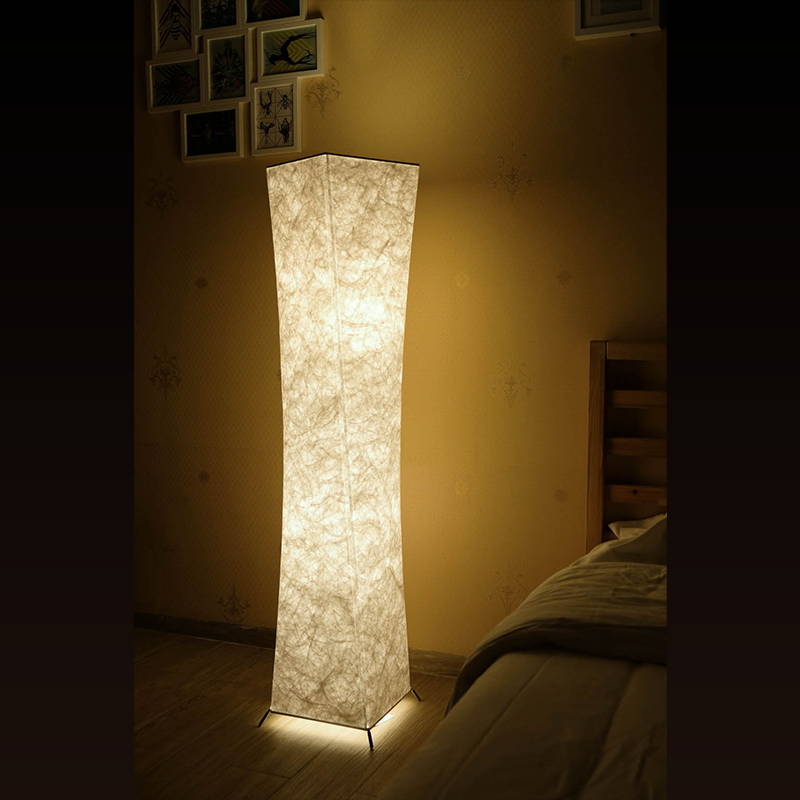 Nordic Elegance LED floor lamp showcasing soft light in a cozy living room setting.