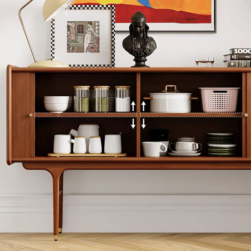 Top view of the cabinet filled with decorative objects, demonstrating its spacious surface.