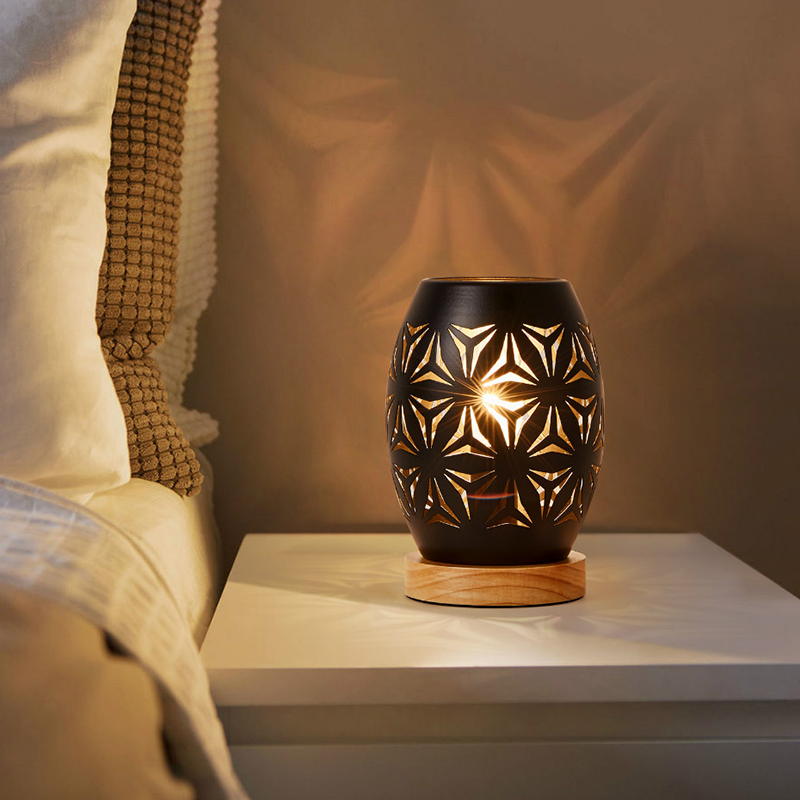 Elegant black LED decorative lamp illuminating a cozy reading nook, highlighting its soft light.