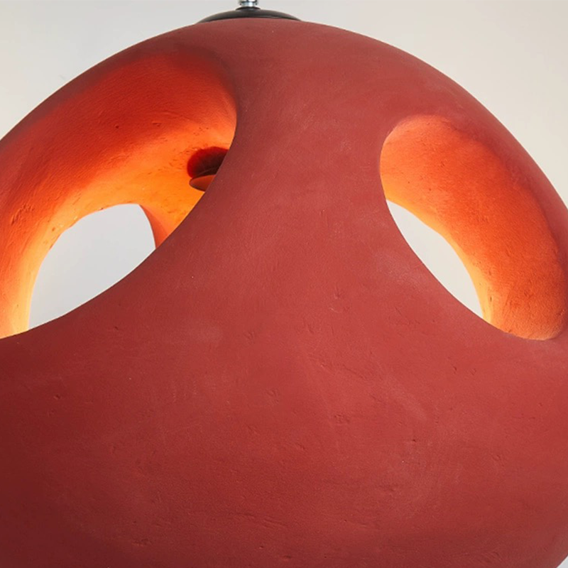 Nordic pendant light hung elegantly above a dining table, enhancing the ambiance.