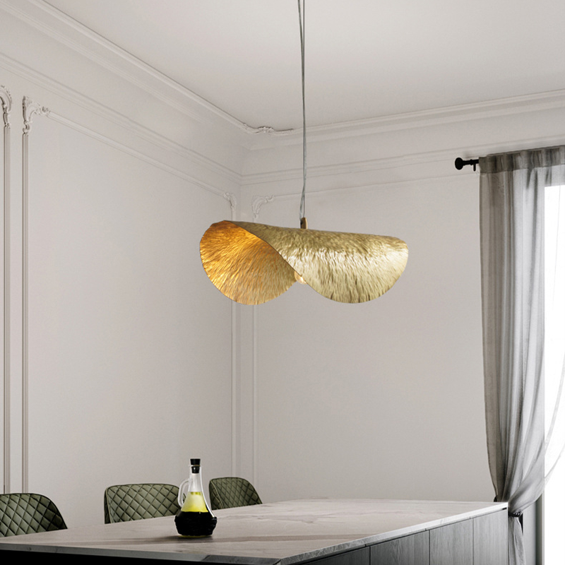 Close-up view of the handmade copper pendant light highlighting its unique hammered finish, suitable for any modern space.