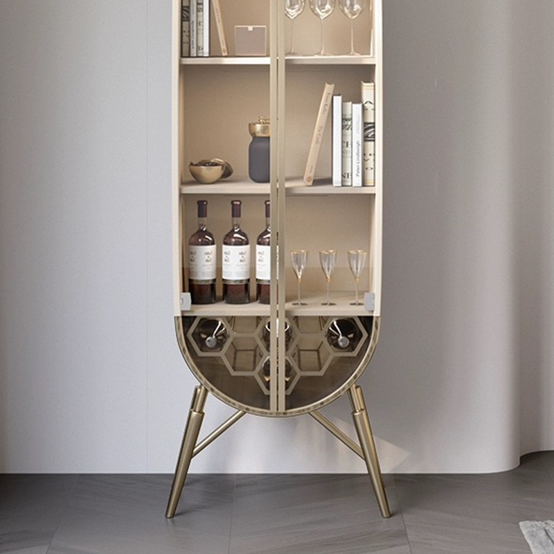 Elegant tall bar cabinet showcasing its glass doors and modern appeal in a living room setting.