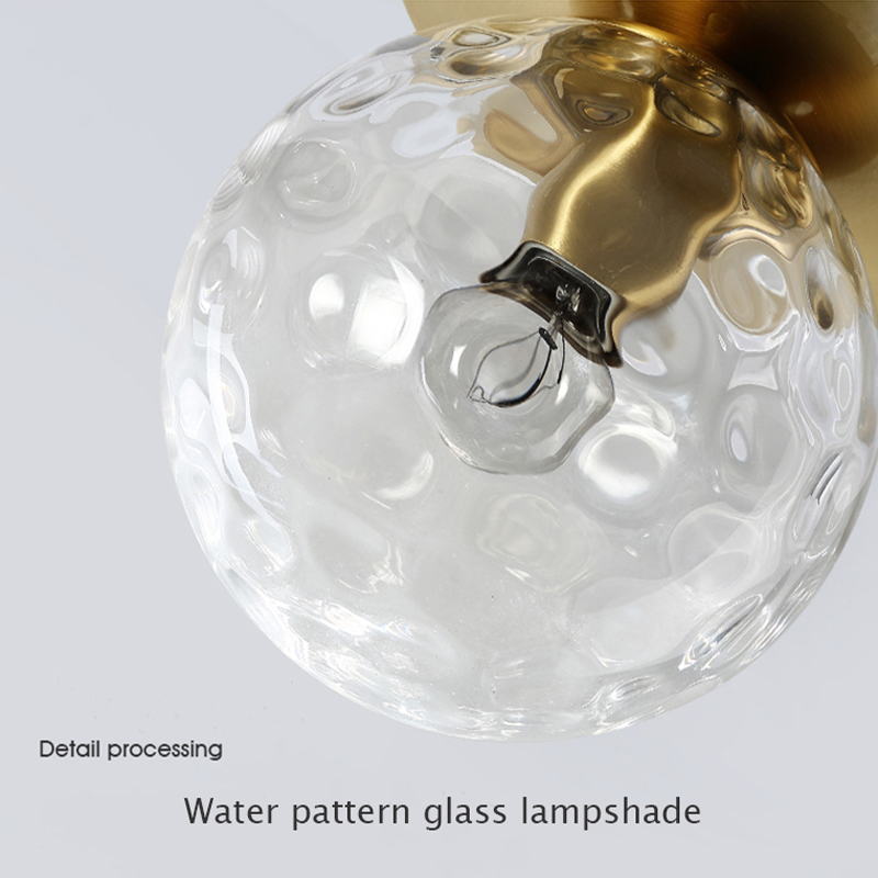 Elegant gold flush mount ceiling light showcasing its unique ripple glass design from a side angle.