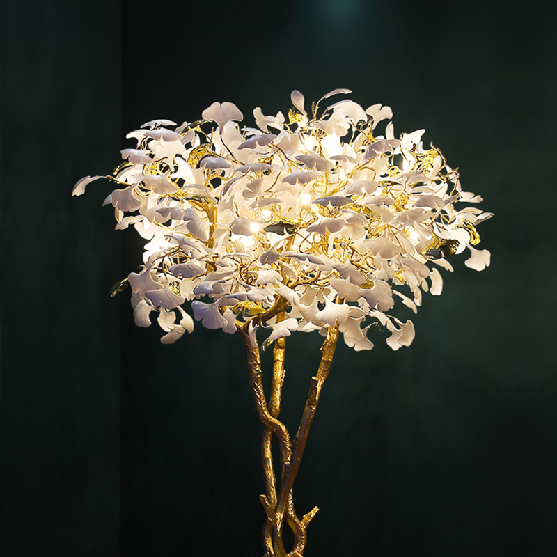 Close-up of the decorative light showcasing the natural ostrich feather shade.