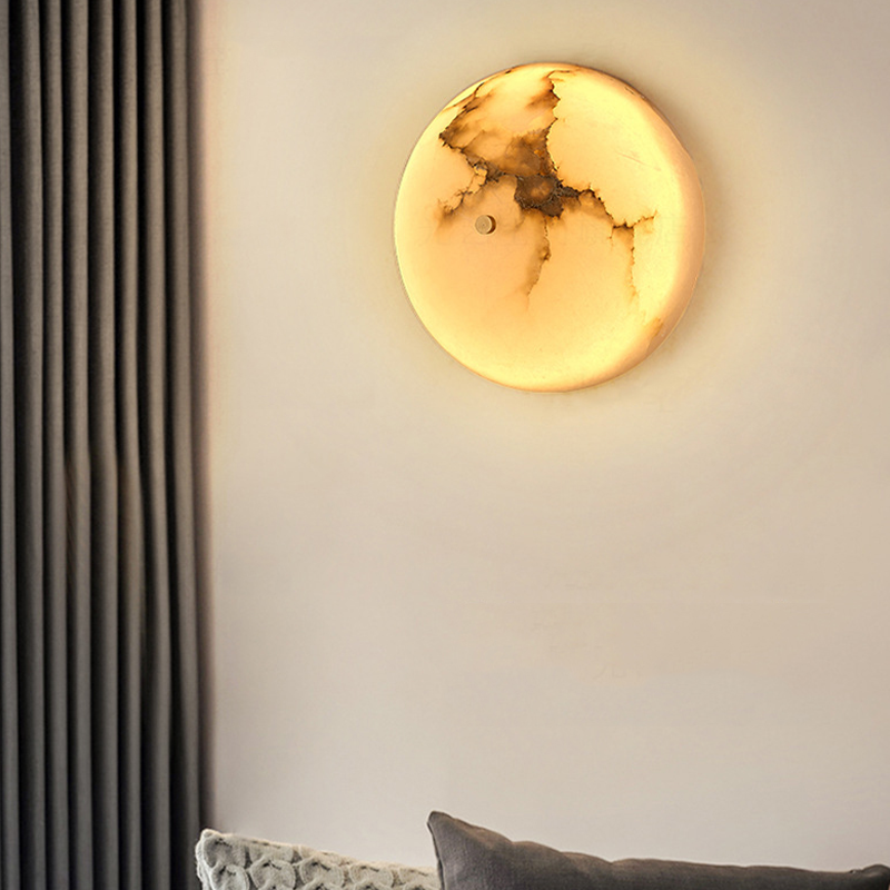 Elegant marble LED wall sconce installed in a cozy living room accentuating the decor