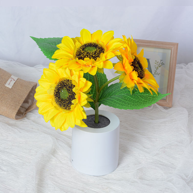 A close-up view of the sunflower lamp showcasing its intricate design and warm light.