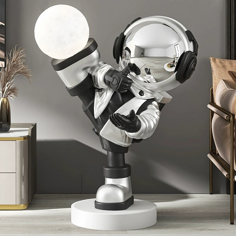 Close-up view of the Cosmic Kung Fu Astronaut floor lamp highlighting its intricate details and vibrant colors.