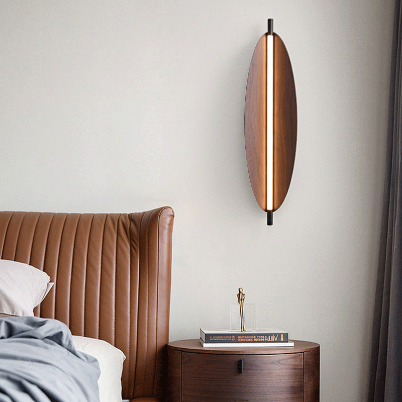 Close-up of the concave shade of the Scandinavian Wood Grain Dimmable LED Wall Lamp, highlighting its organic shape.