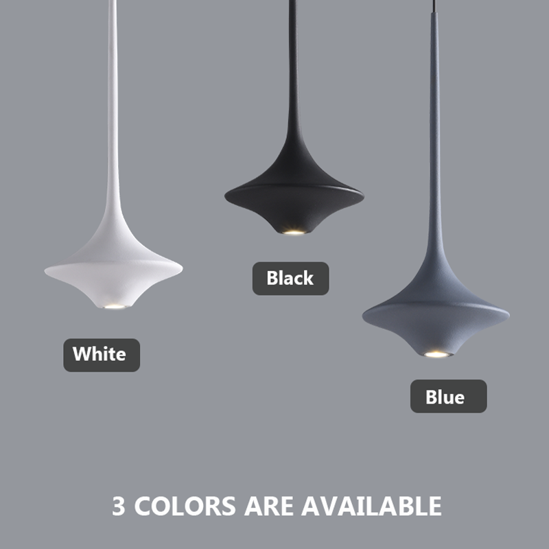 Sleek LED pendant light in a modern dining room setting, highlighting its elegant design and soft illumination.