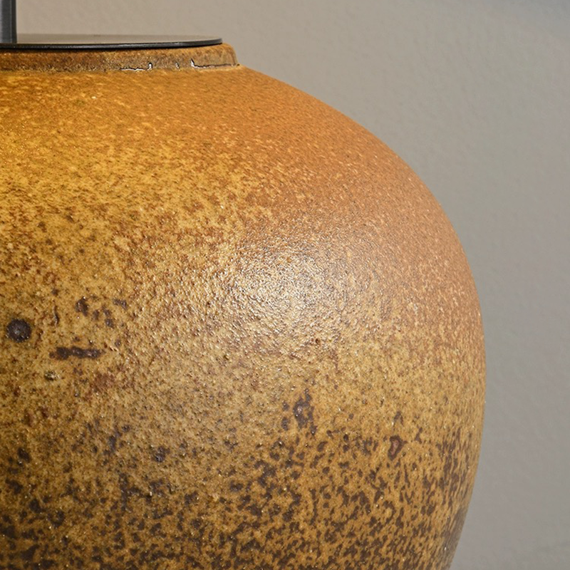 Lifestyle shot of the table lamp in a cozy living room setting, enhancing the Japanese decor.