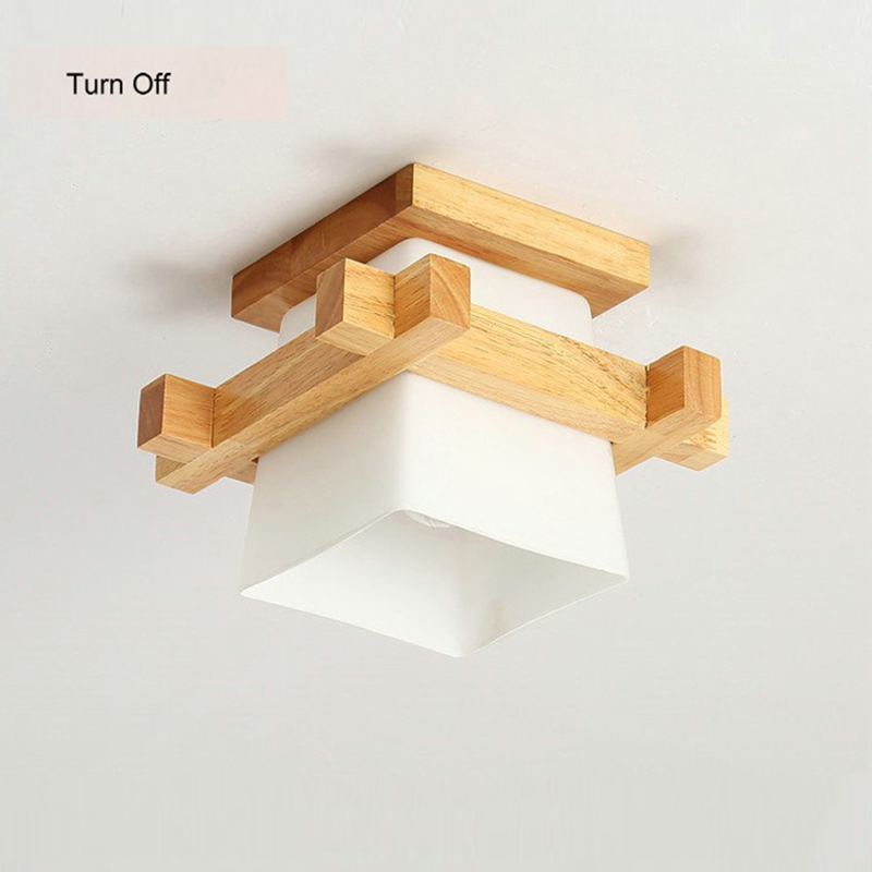 Overhead angle of the ceiling light installed in a minimalist Japanese-style foyer