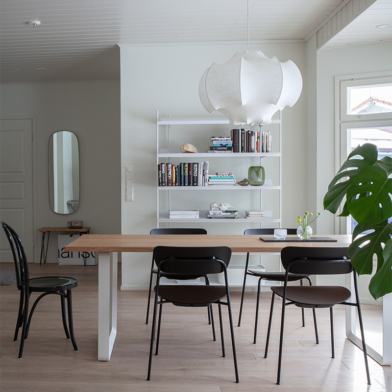 The Nordic silk lamp illuminating a stylish hotel lobby with its elegant glow.