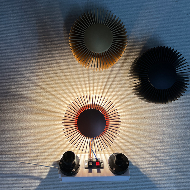 Close-up of the Elegant Industrial Flower Wall Lamp highlighting its copper frame and glass lampshade.
