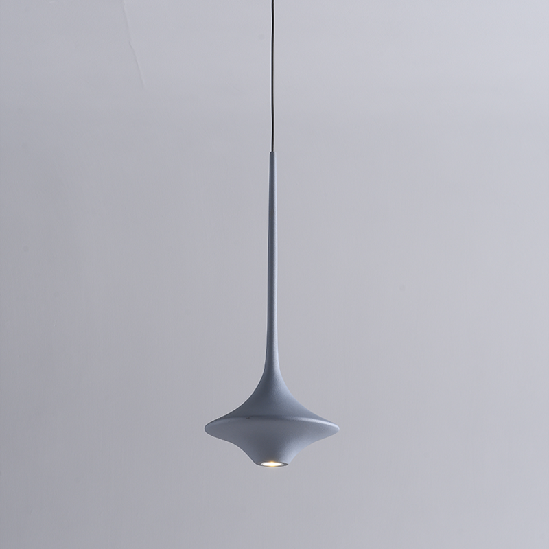 Unique pendant light hanging in a stylish bar, demonstrating its versatility and contemporary aesthetic.