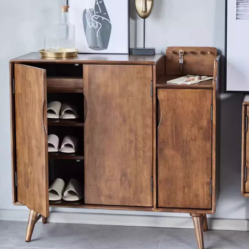 Front view of minimalist freestanding shoe cabinet for small spaces with open double doors showing shoe storage