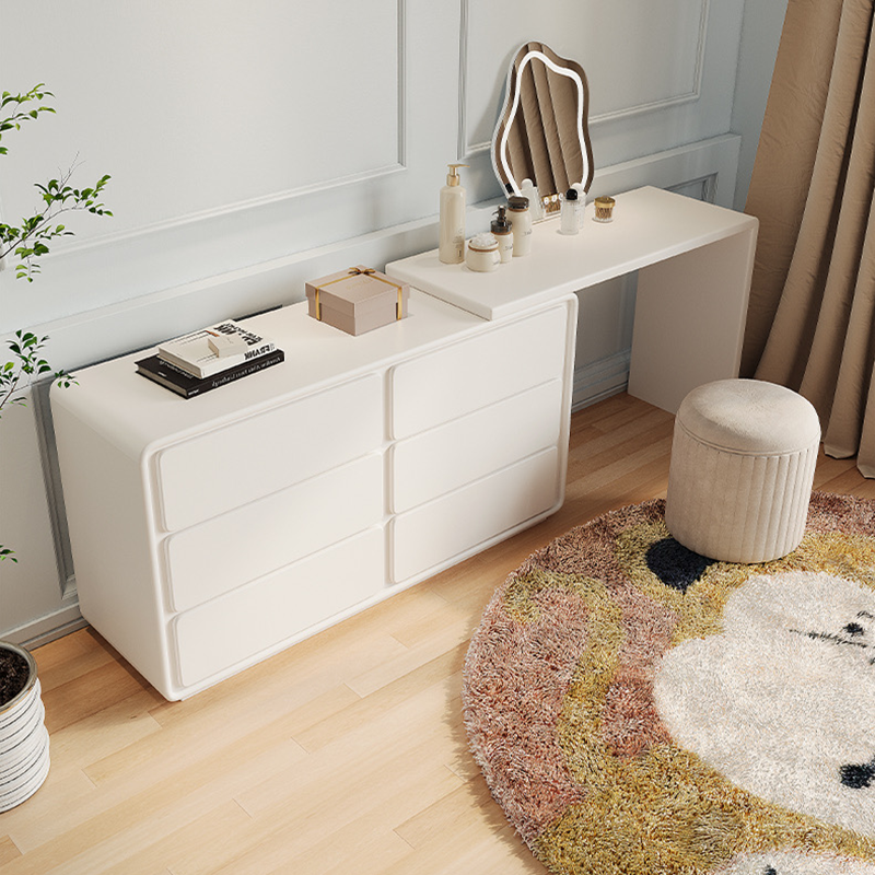 Stylish vanity table for small spaces, positioned in a cozy bedroom corner.