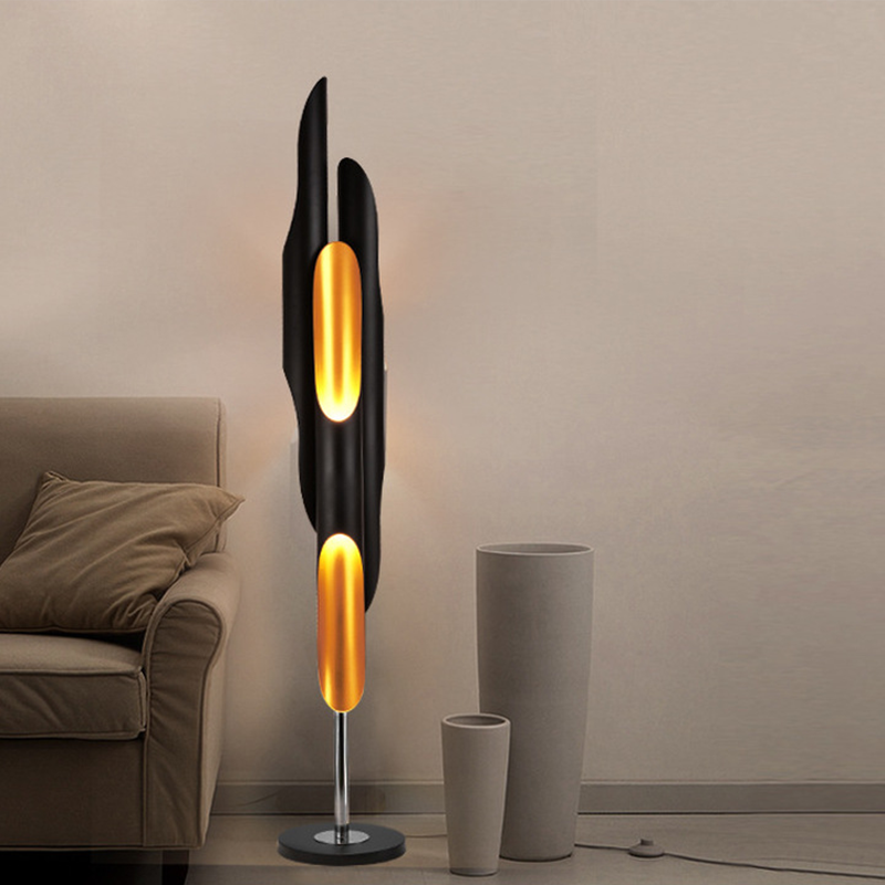 Elegant Golden Black Aluminum Tube Floor Lamp in a cozy living room setting.