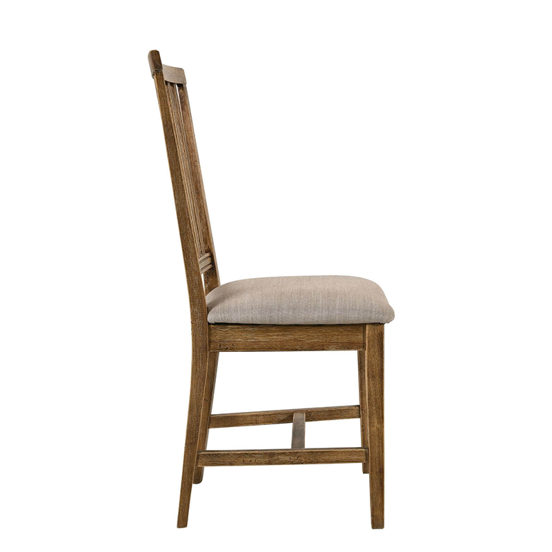 Close-up view of the tan linen upholstery on the padded dining chairs, highlighting the quality and comfort.