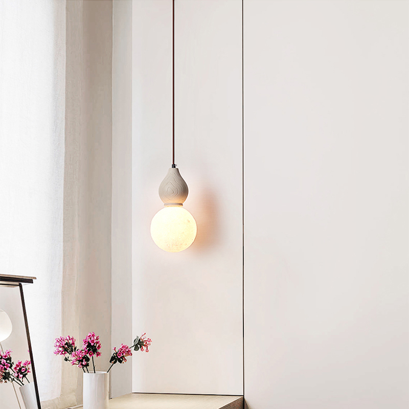 Close-up view of the antique pendant lights textured finish, emphasizing its artistic detail.