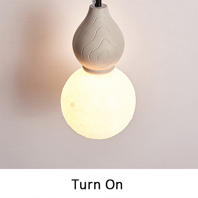 Close-up view of the antique pendant lights textured finish, emphasizing its artistic detail.