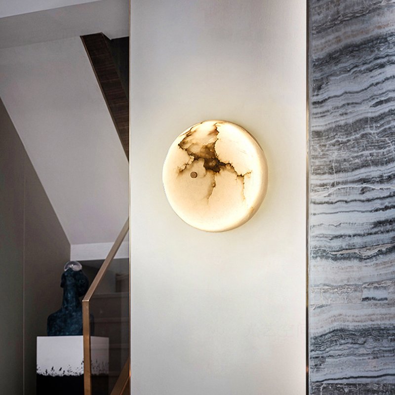 Elegant marble LED wall sconce showcasing the intricate marble pattern from the side
