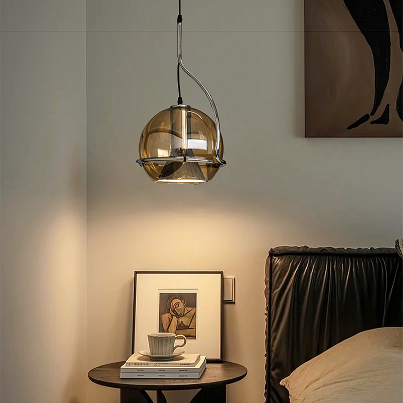 Close-up view of the modern amber glass pendant lamp showcasing its elegant design.