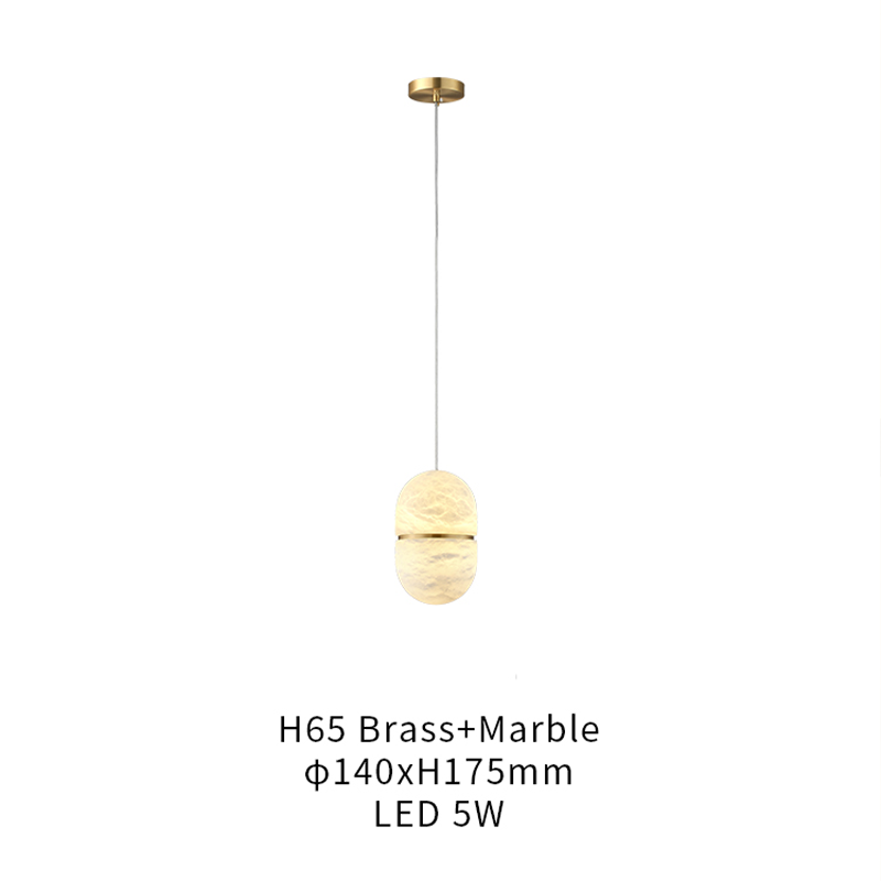 Close-up of the marble pendant light illuminating a cozy bedroom, highlighting its soft glow.