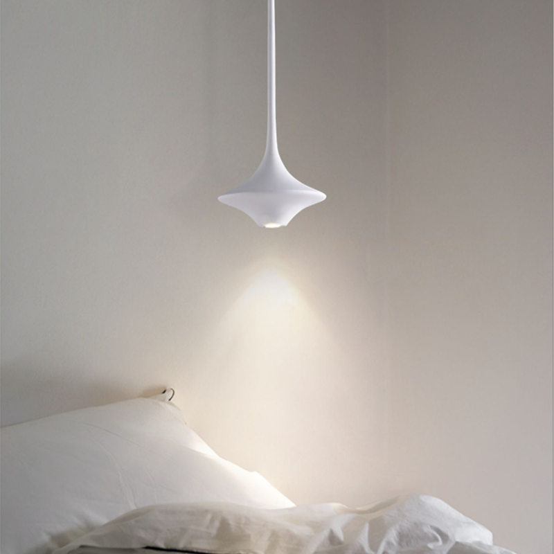 Unique pendant light hanging in a stylish bar, demonstrating its versatility and contemporary aesthetic.