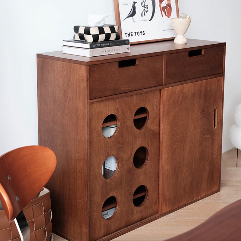 Side view of the 39" walnut birchwood storage cabinet showcasing its drawers and cabinets.