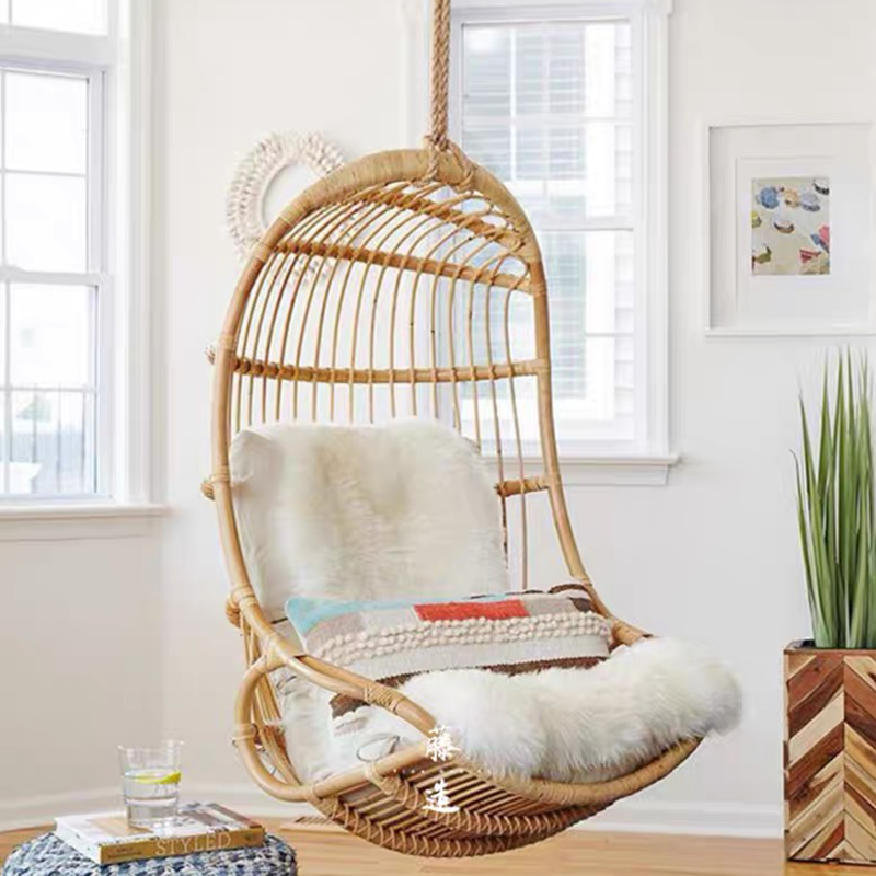 Close-up of the high quality indoor swing for relaxation, showcasing its premium rattan craftsmanship.