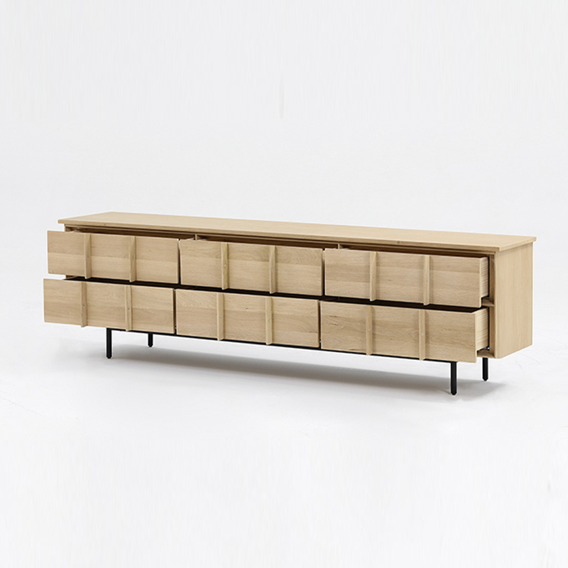 Front view of the elegant solid oak TV stand showcasing six drawers and cable management features.