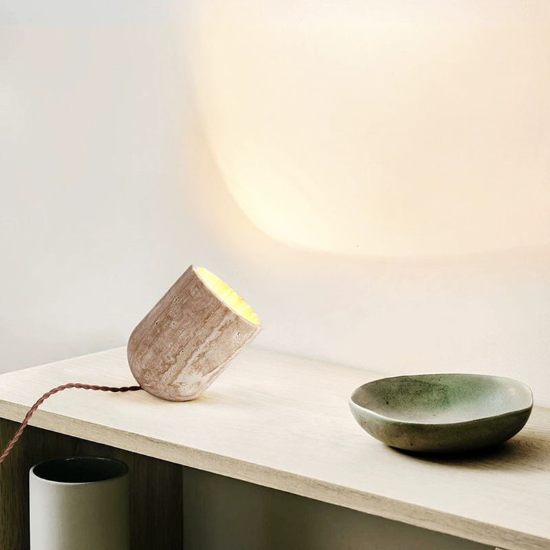 Nordic cream wood table lamp from an angle, highlighting its LED light feature.
