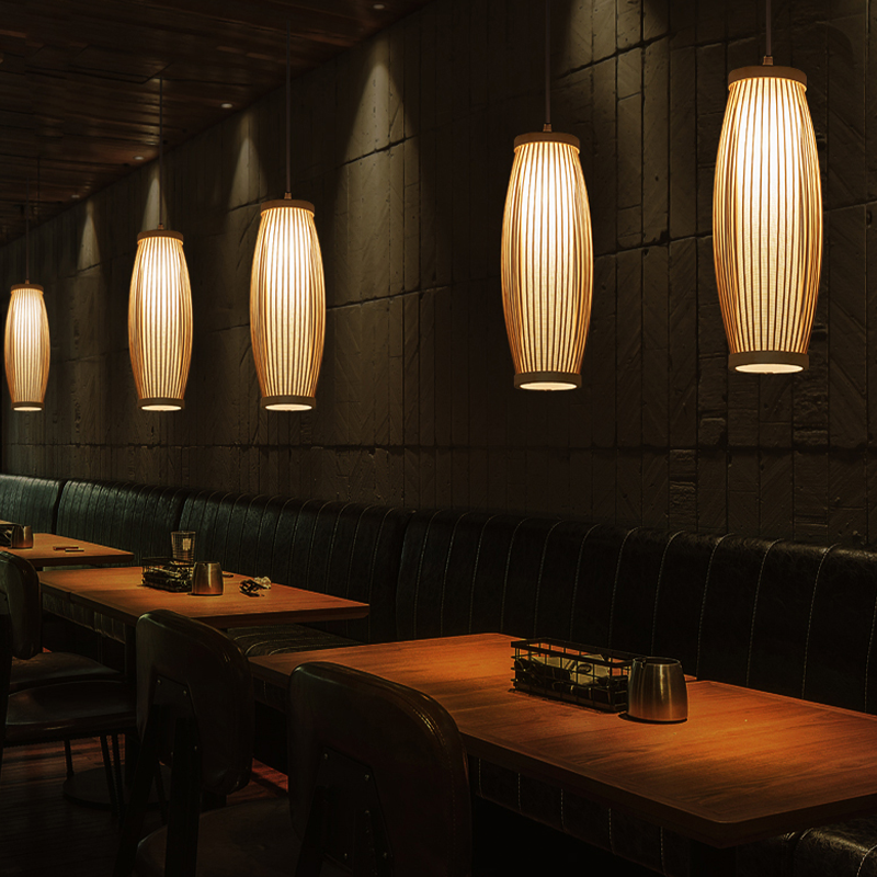 Close-up of the bamboo lamp showcasing its intricate handwoven design.
