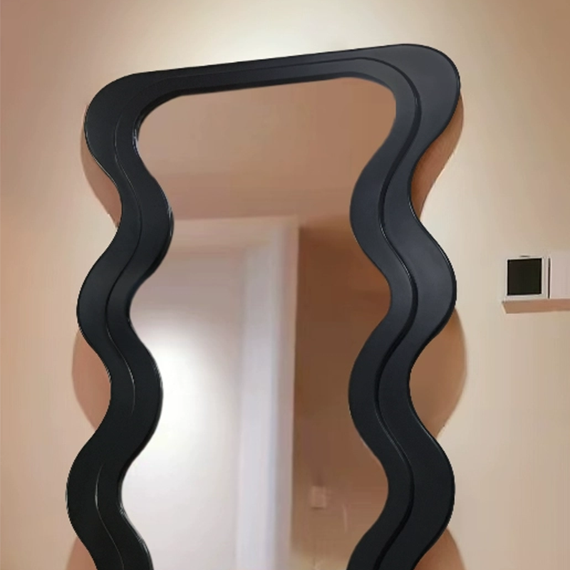 Elegant scallop full length mirror showcasing its unique design in a stylish hallway.