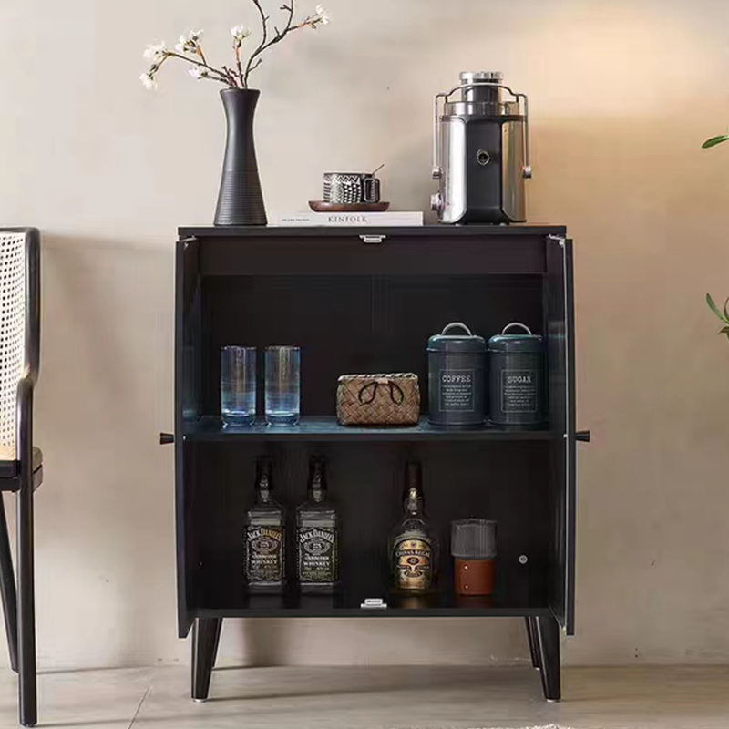 Angle shot highlighting the texture of the cheap sideboard cabinet with rattan doors against wood flooring