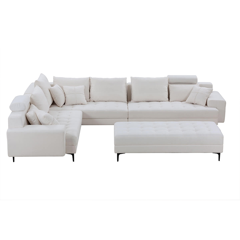 Close-up of the comfortable cushions on the off white L-shaped sofa, showcasing its soft fabric.