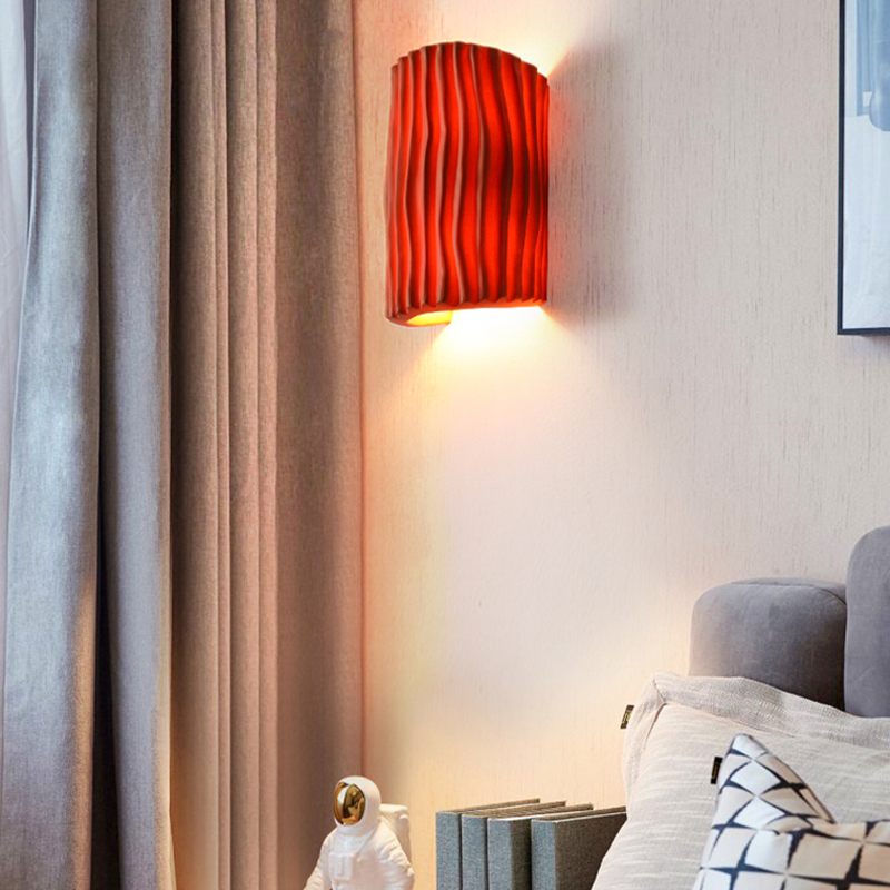 Close-up of the modern geometric LED wall sconce showcasing its pleated design