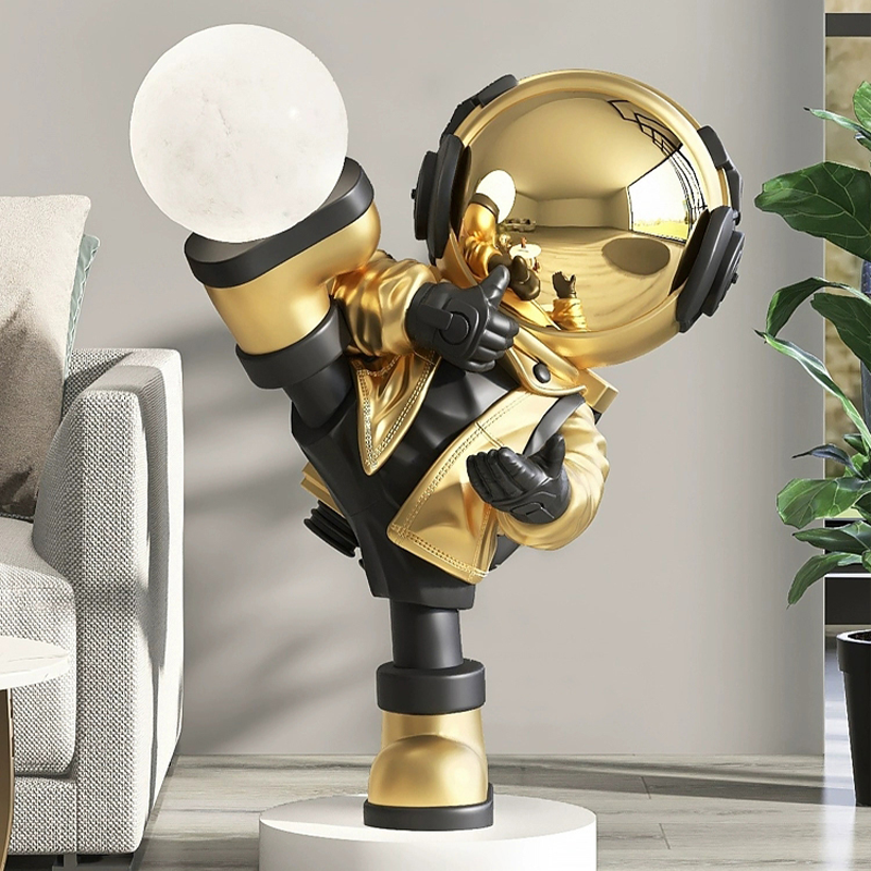 Cosmic Kung Fu Astronaut LED Floor Lamp showcasing its clear glass shade and unique design in a stylish living room.