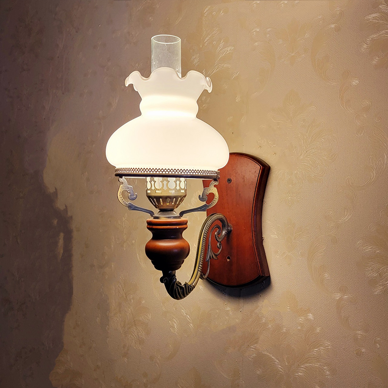 Vintage Glass LED Wall Lamp mounted in a cozy living room setting, providing warm illumination.