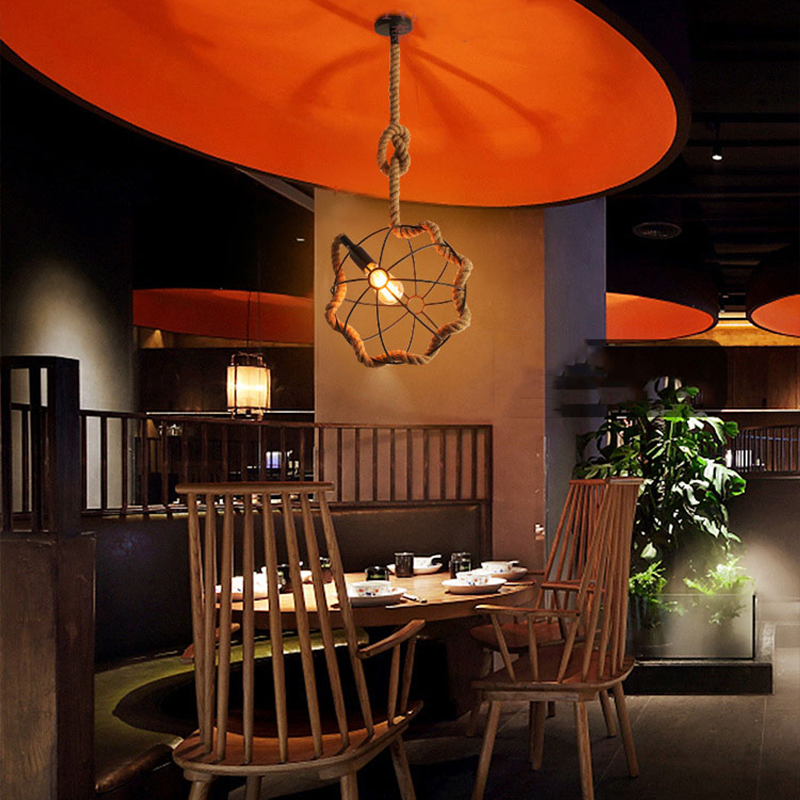 The hemp rope industrial pendant light hanging in a beautifully decorated living room.