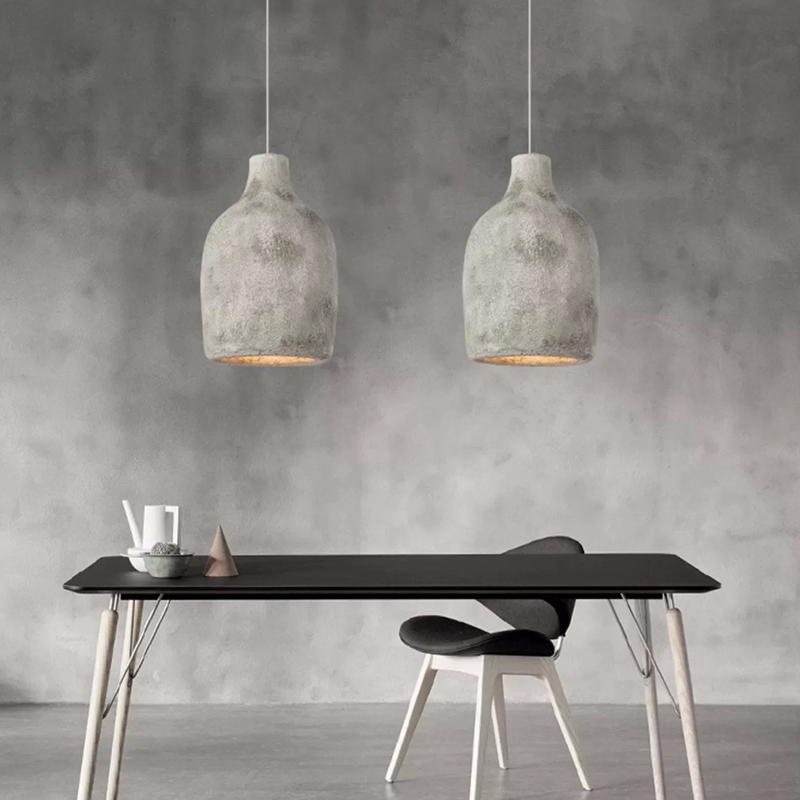 Elegant Japanese-style resin pendant light in a cozy living room setting.