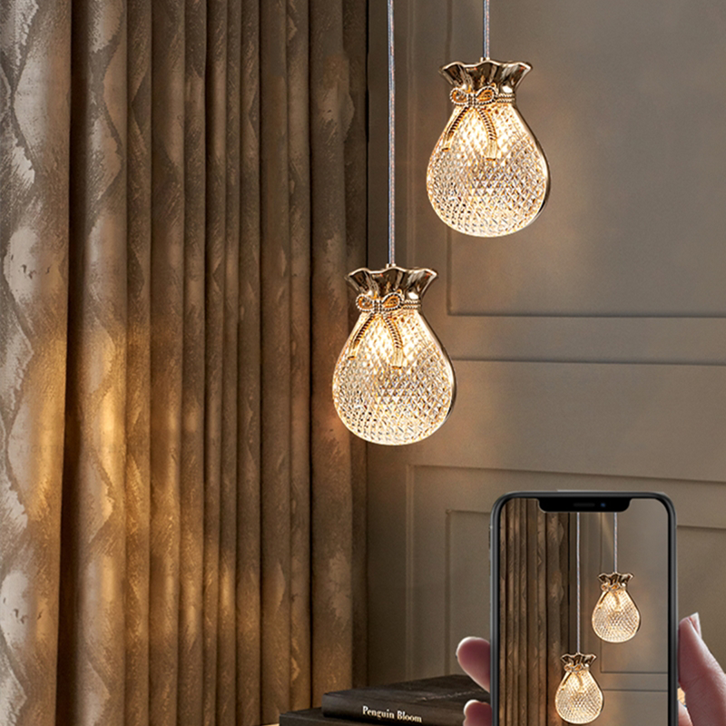 Close-up of the glass shade of the pendant light showcasing its unique design.