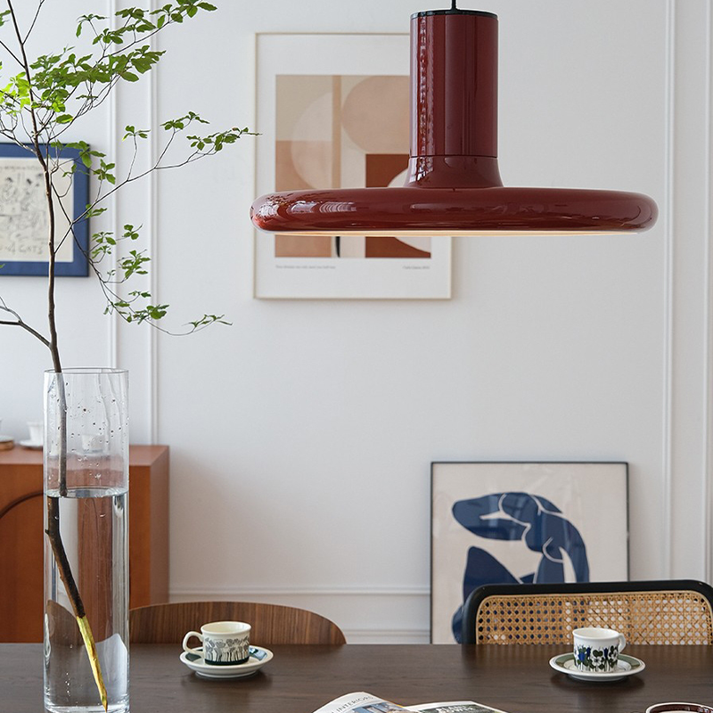 Retro Red UFO Pendant Light hanging elegantly in a modern kitchen setting.