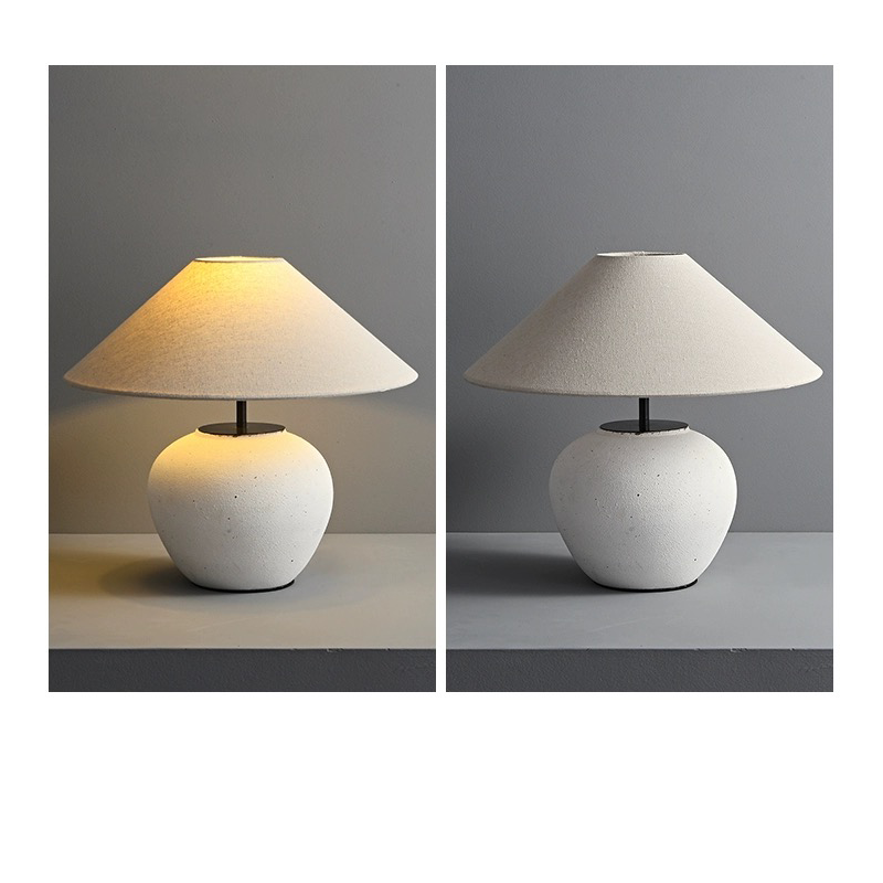 Front view of the Japanese luxury handmade pottery table lamp showcasing its elegant fabric lampshade.