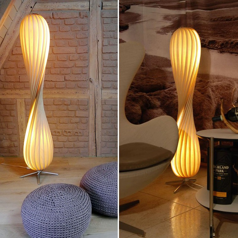 Close-up of the wooden frame and fabric shade of the LED floor lamp.