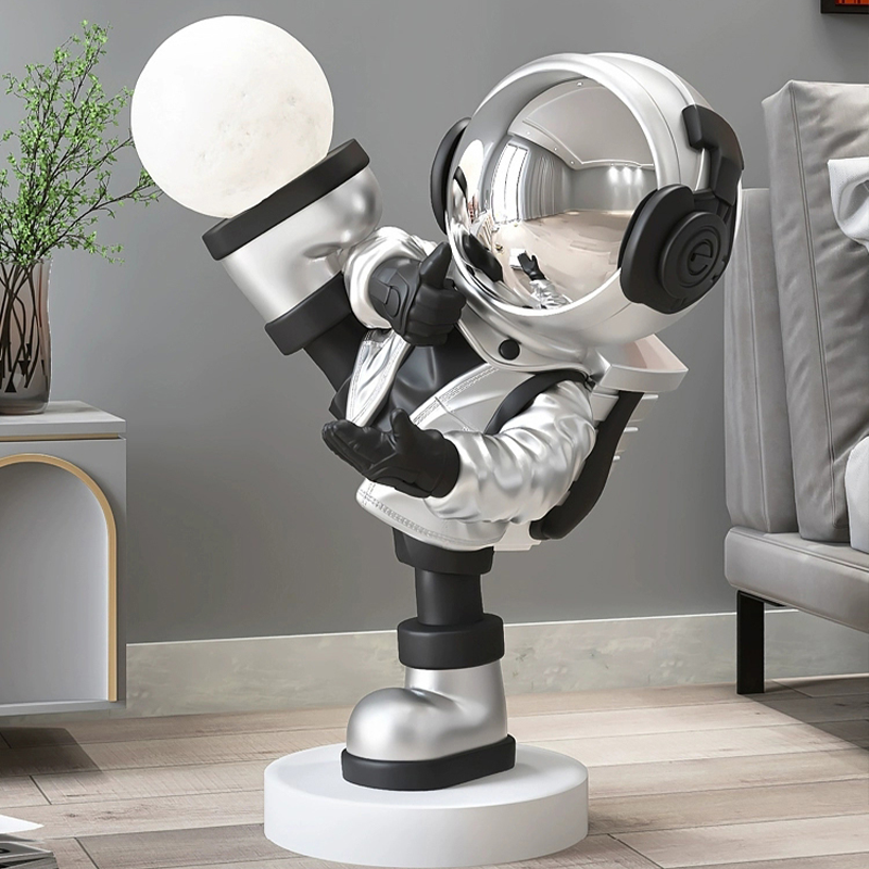 Astronaut LED floor lamp placed in a childrens room, adding a playful touch to the decor.